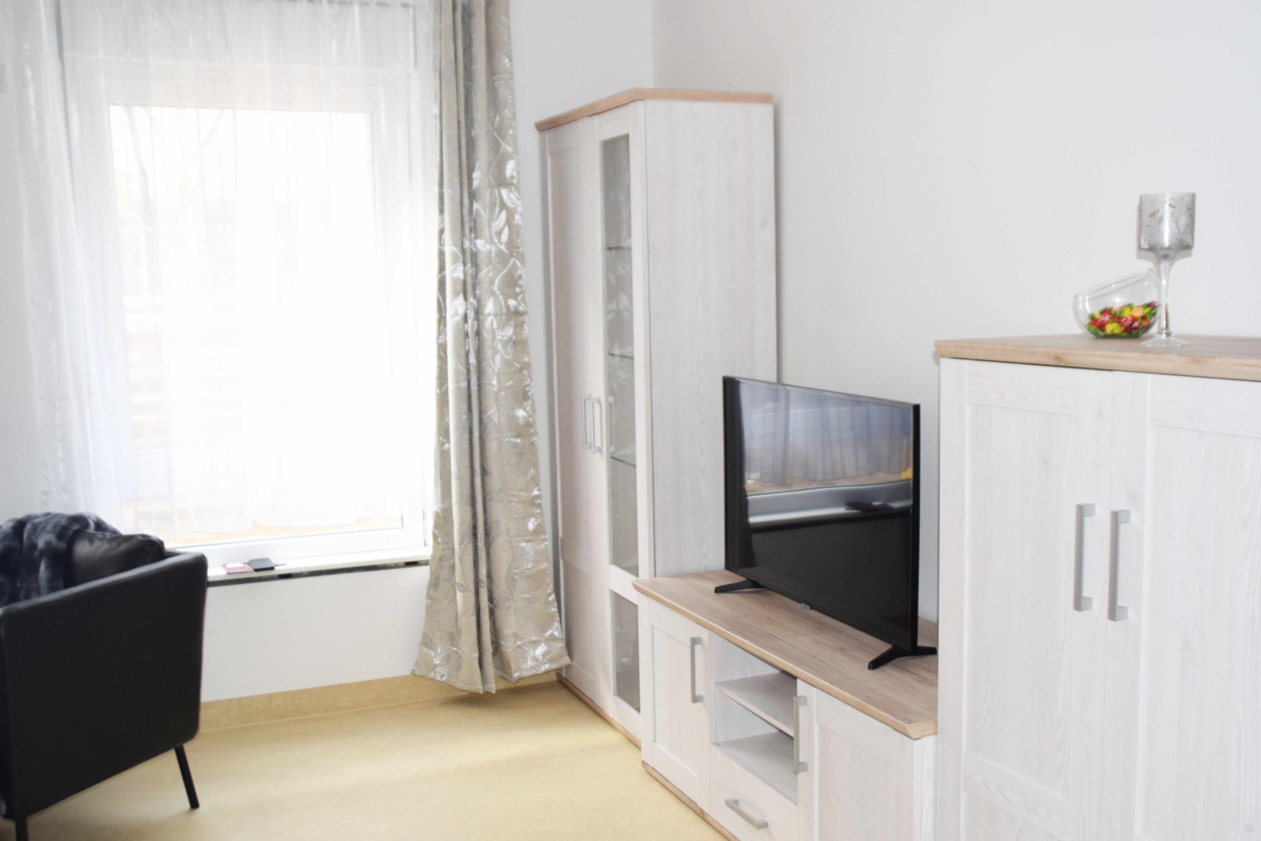 Wohnbereich mit Stauraum im Haus Irene